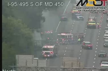 Fire crews battle trailer, brush fire along Capital Beltway